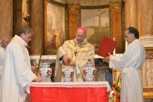 Rivestiti per grazia delle vesti di salvezza